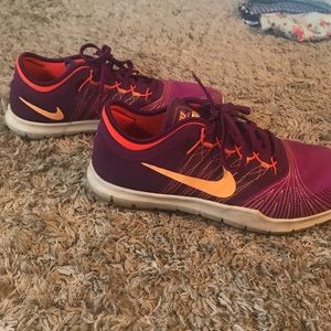Purple Nike running shoes